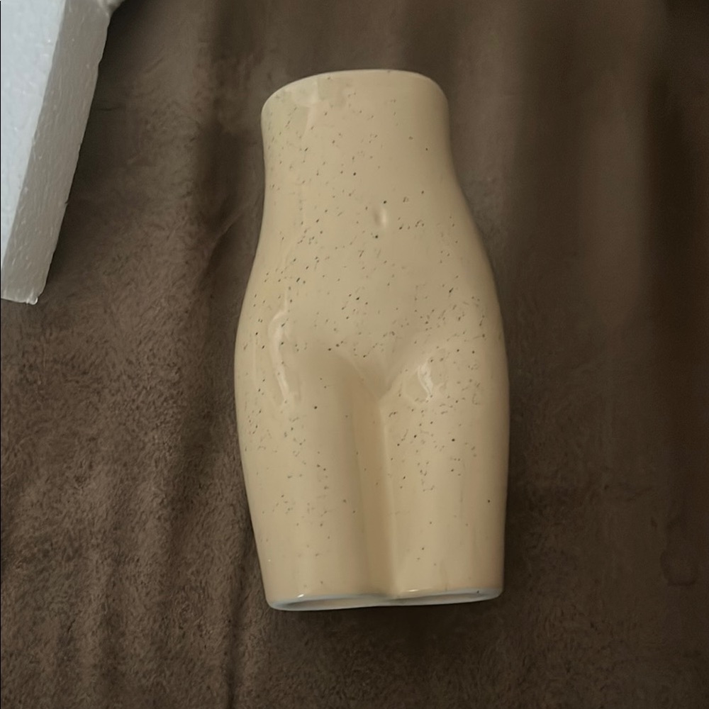 Female form vase